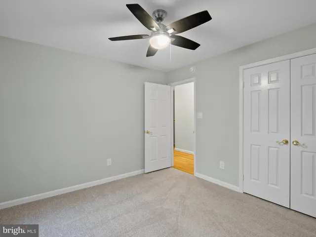 a bathroom with a sink vanity and a mirror