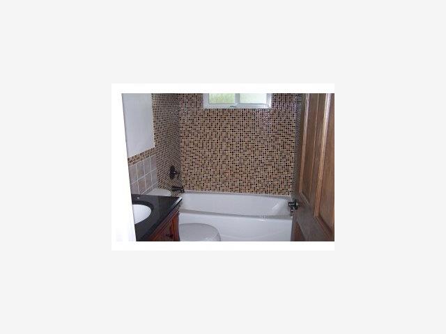 22550 Alcalde Road Cupertino, CA 95014 - Photo 6 of 9 a bathroom with a sink and a shower