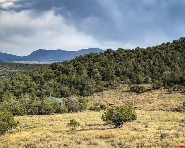 a view of mountain view with mountains in the background