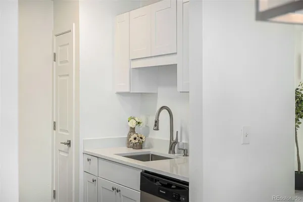 a close view of a sink and a vanity in the bathroom