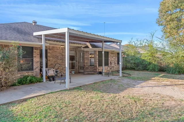 a house view with a outdoor space