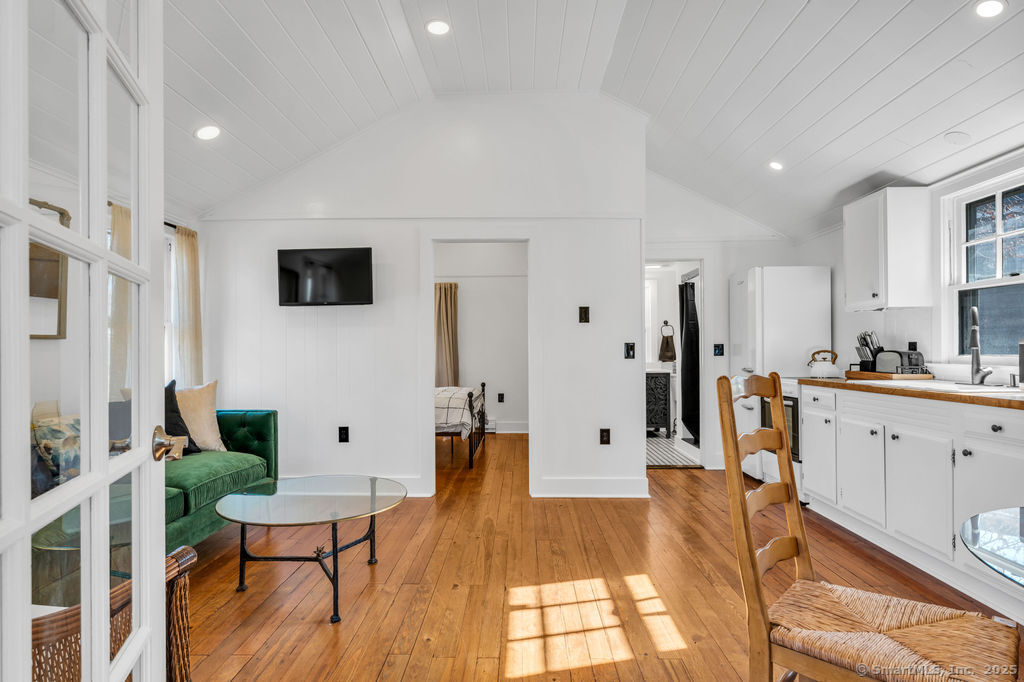 69 Waterside Lane, Unit 2 Clinton, CT 06413 - Photo 14 of 14 a view of kitchen with furniture and a wooden floor