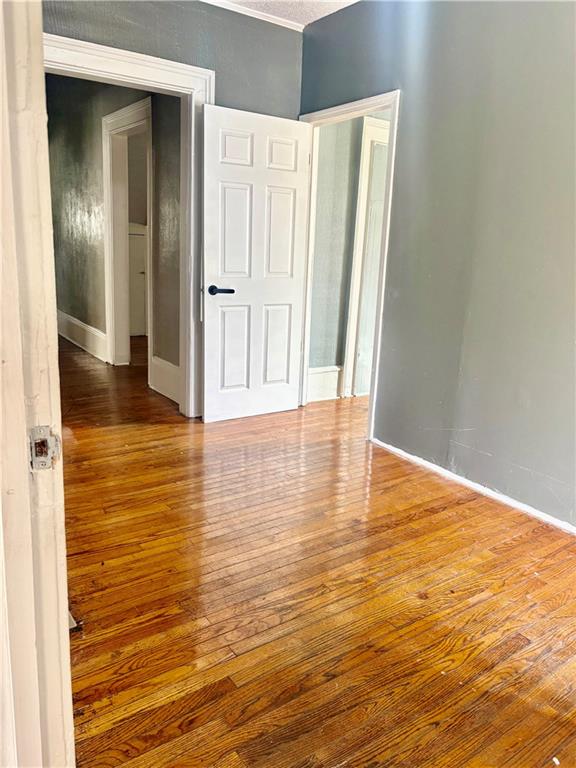 343 Cairo Street Northwest Atlanta, GA 30314 - Photo 13 of 13 a view of a hallway with wooden floor