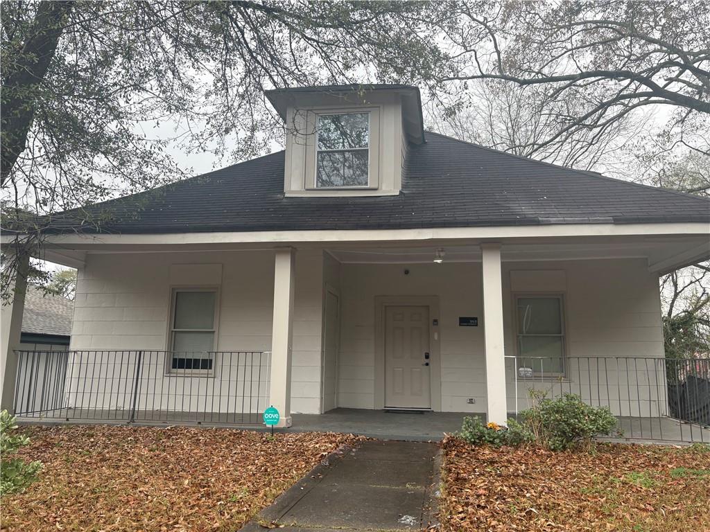 343 Cairo Street Northwest Atlanta, GA 30314 - Photo 2 of 13 a front view of a house with a yard