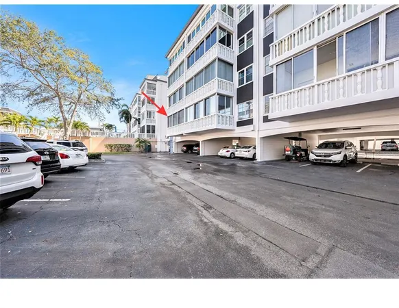a view of a cars parked in front of a building