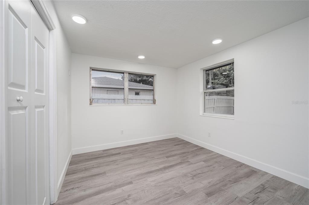 3409 Corey Road Sarasota, FL 34232 - Photo 15 of 19 a view of a room with wooden floor and window