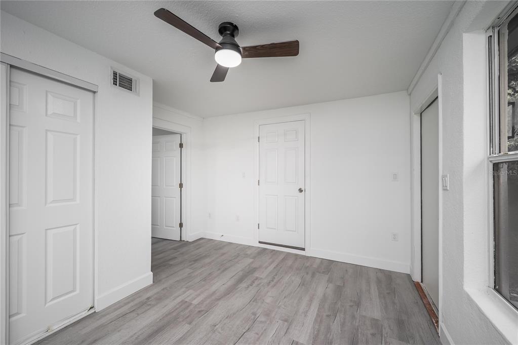 3409 Corey Road Sarasota, FL 34232 - Photo 8 of 19 wooden floor in an empty room