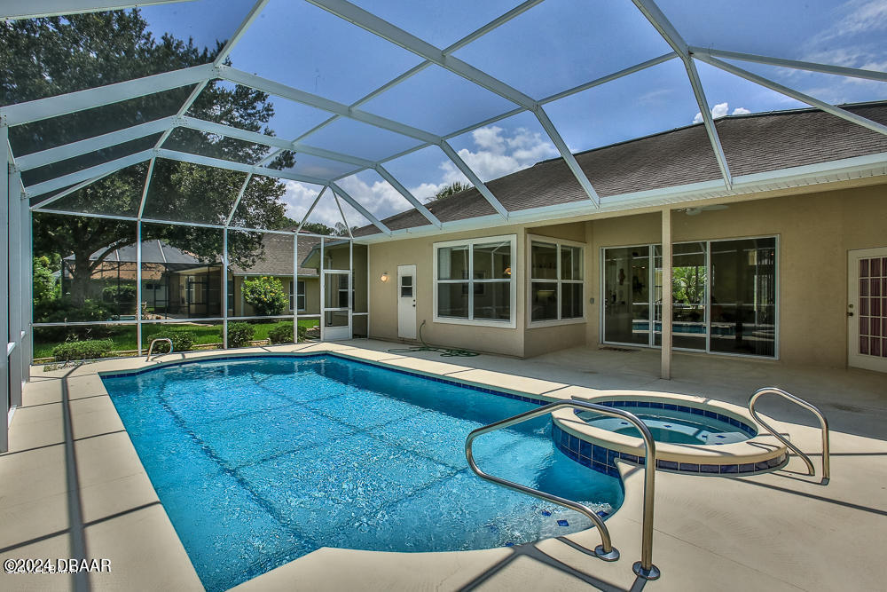 5 Bent Stream Way Ormond Beach, FL 32174 - Photo 7 of 29 POOL AND BACK OF HOUSE