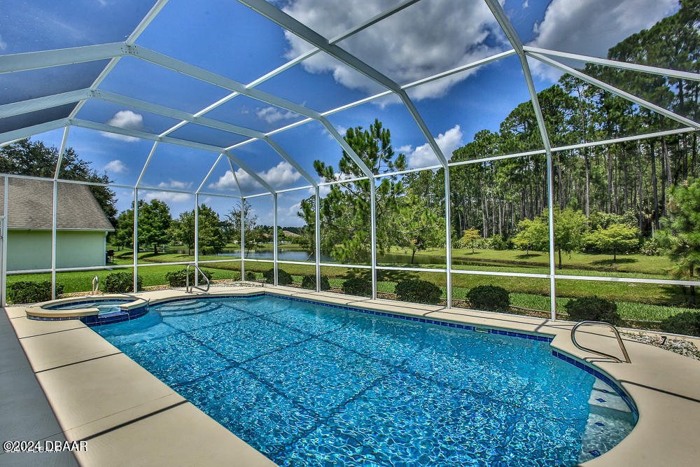 5 Bent Stream Way Ormond Beach, FL 32174 - Photo 8 of 29 POOL WITH TREES BEHIND