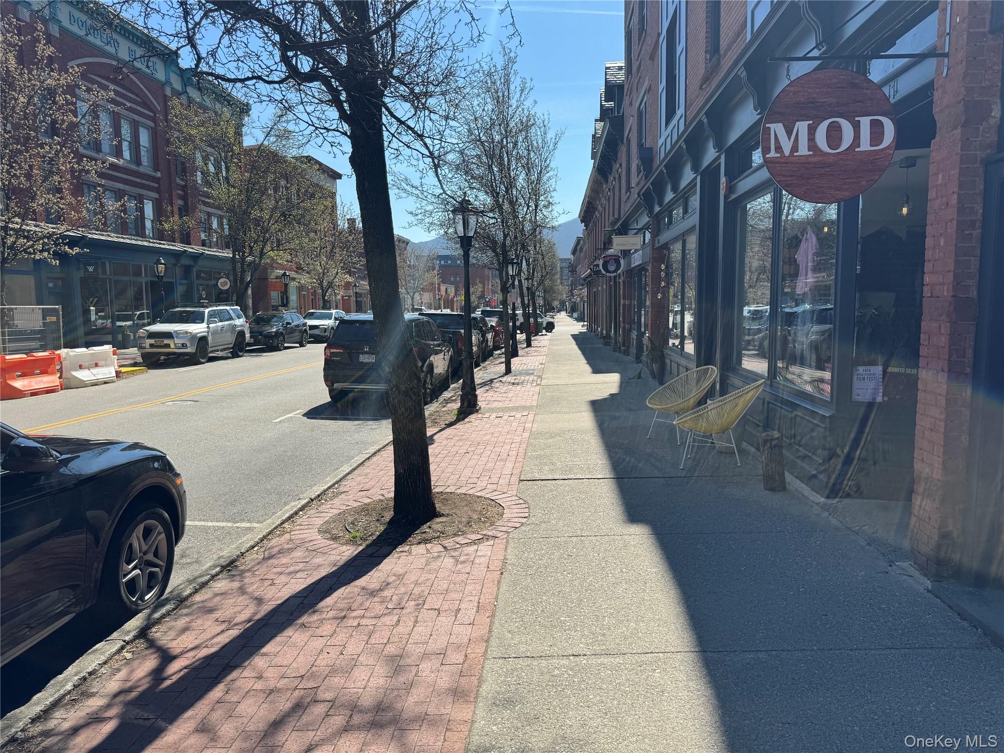 167 Main Street, Unit 2 Beacon, NY 12508 - Photo 2 of 19 a view of a street with cars
