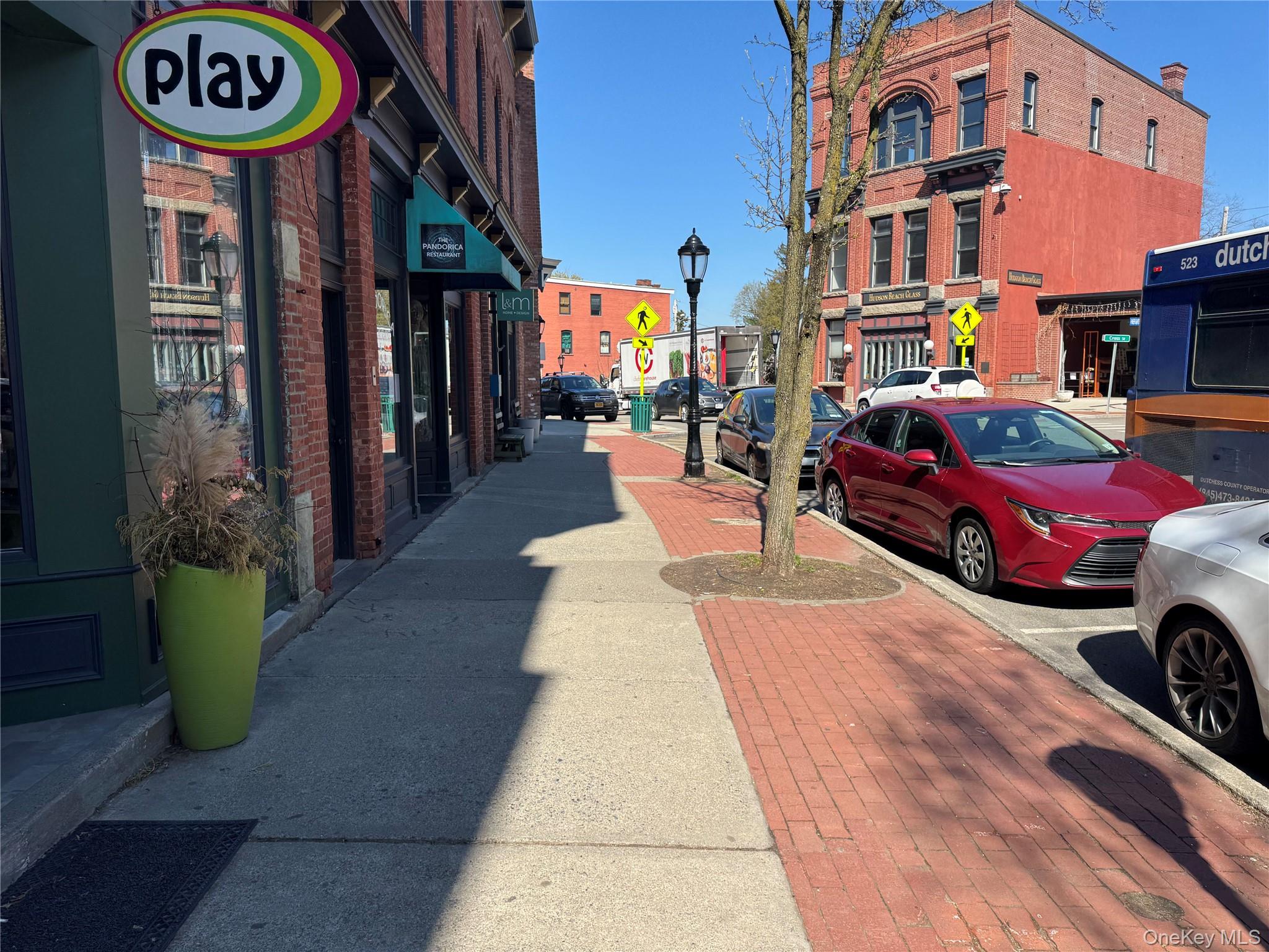 167 Main Street, Unit 2 Beacon, NY 12508 - Photo 3 of 19 a view of a street with cars