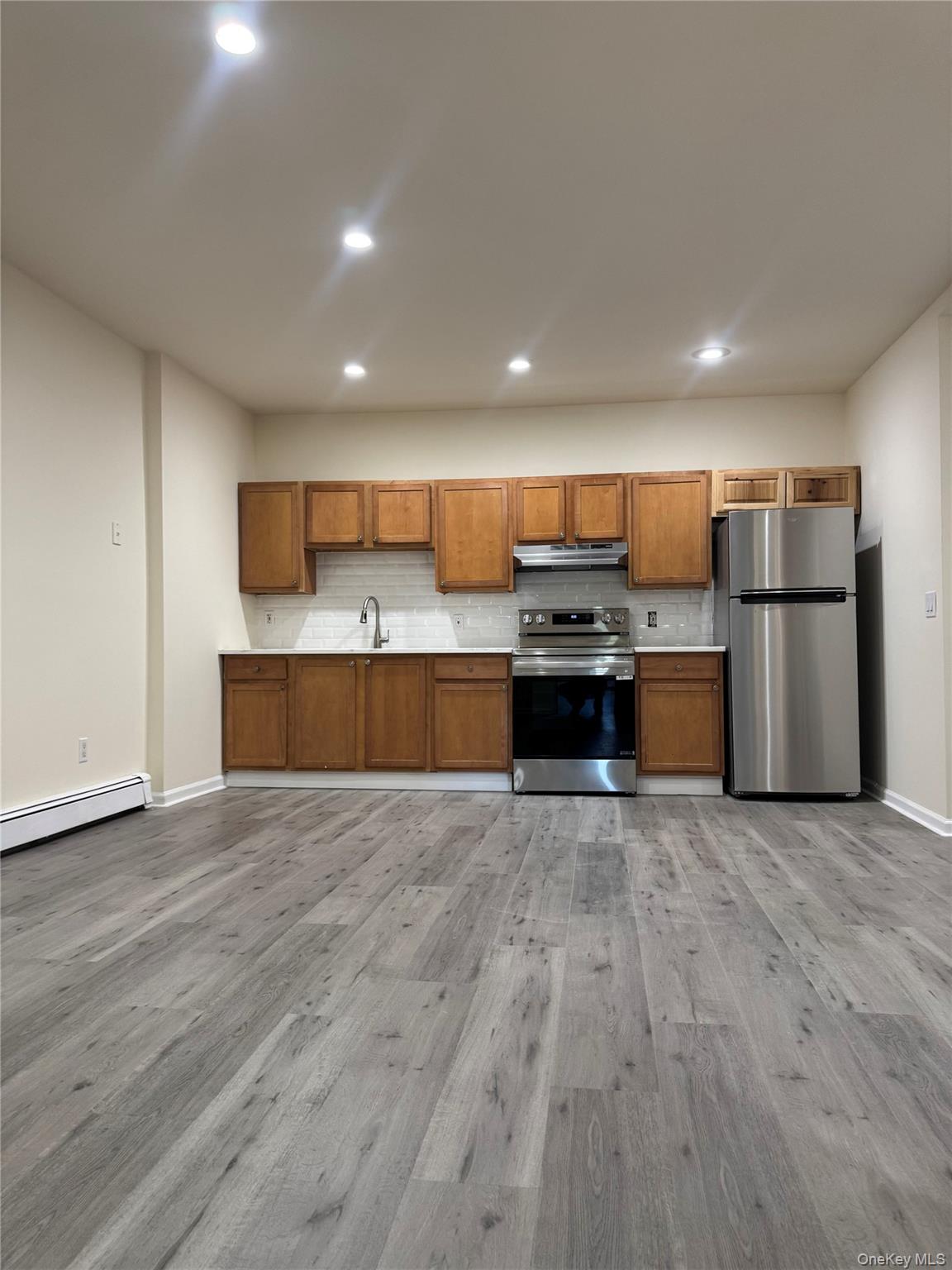 167 Main Street, Unit 2 Beacon, NY 12508 - Photo 4 of 19 a view of kitchen with wooden floor