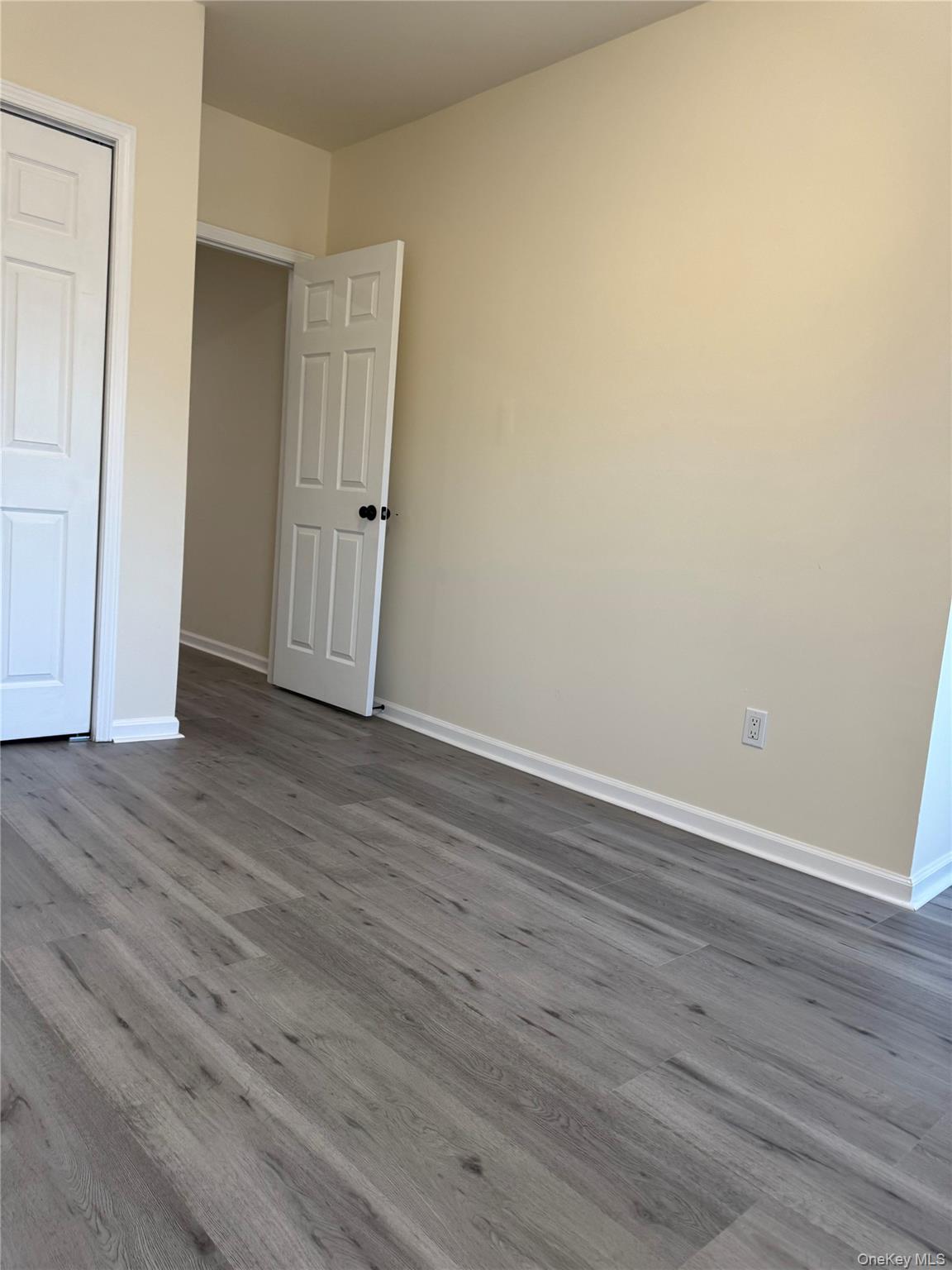 167 Main Street, Unit 2 Beacon, NY 12508 - Photo 7 of 19 a view of an empty room with wooden floor