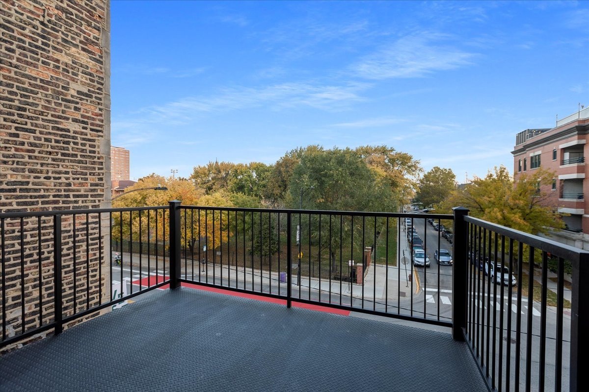 1313 West Chicago Avenue, Unit 3F Chicago, IL 60642 - Photo 12 of 16 a view of city from balcony