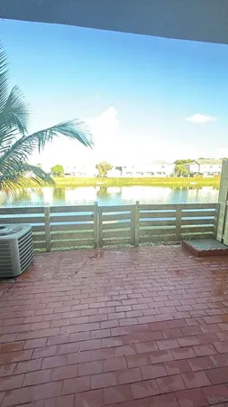 a view of a swimming pool and outdoor space