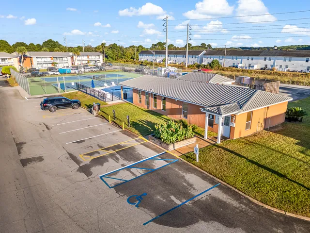 a view of a patio with swimming pool