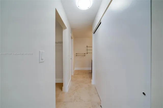 a bathroom with a sink vanity and a mirror