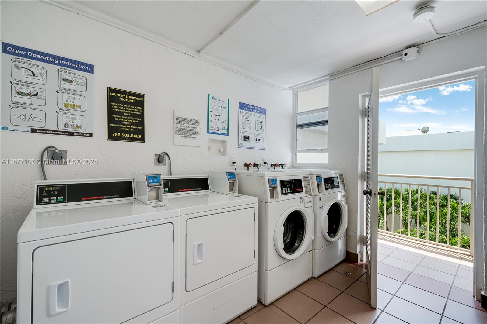 1665 Bay Road, Unit 521 Miami Beach, FL 33139 - Photo 20 of 25 a utility room with dryer and washer