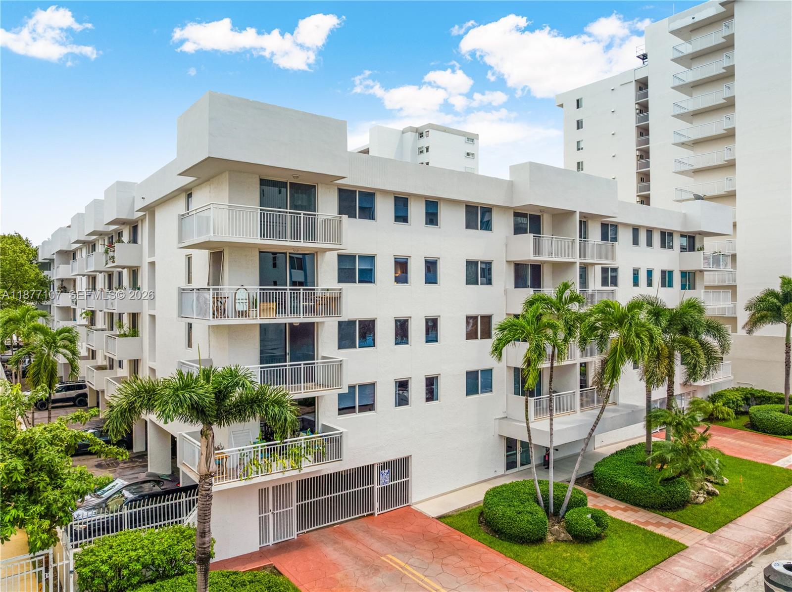 1665 Bay Road, Unit 521 Miami Beach, FL 33139 - Photo 23 of 25 a view of a building with garden