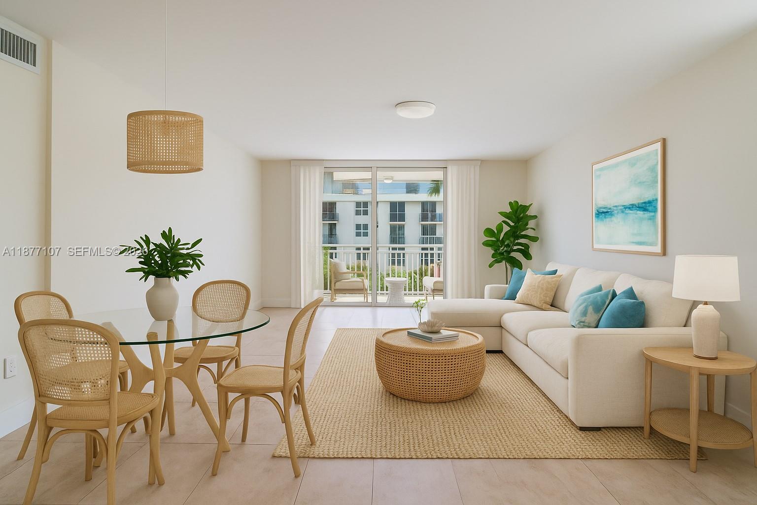 1665 Bay Road, Unit 521 Miami Beach, FL 33139 - Photo 3 of 25 a living room with furniture and a potted plant