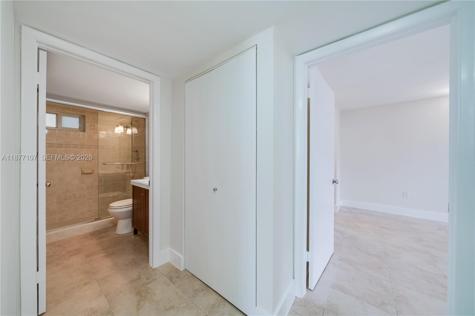 1665 Bay Road, Unit 521 Miami Beach, FL 33139 - Photo 10 of 25 a bathroom view of a toilet and a sink