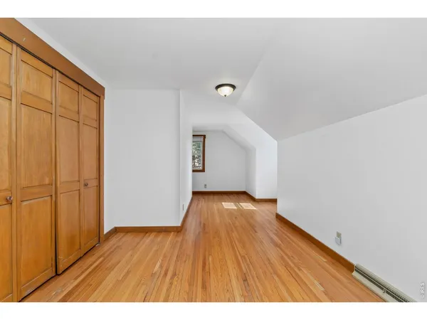 a workspace with furniture and wooden floor