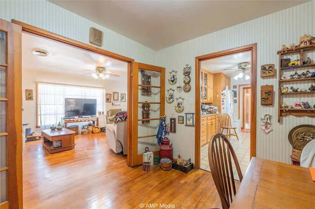 a view of a livingroom with furniture and a flat screen tv