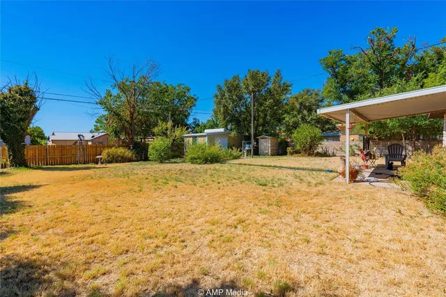 a view of backyard of the house