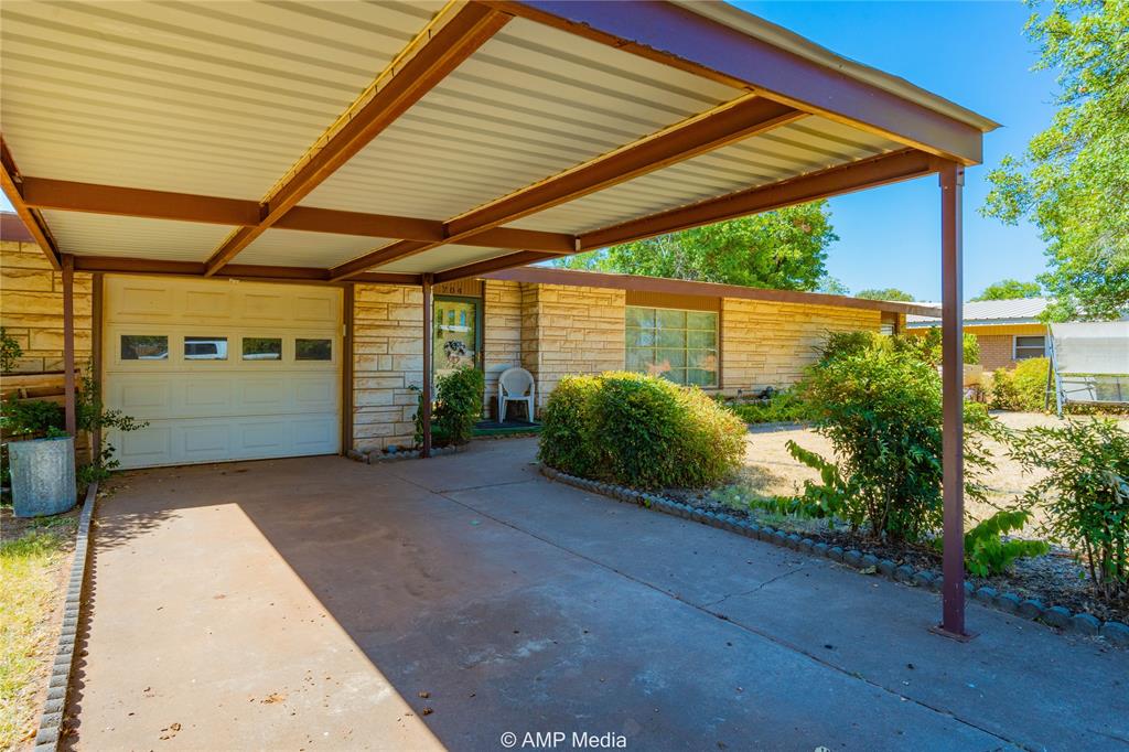 704 East Burnside Street Rotan, TX 79546 - Photo 4 of 31 a view of a backyard