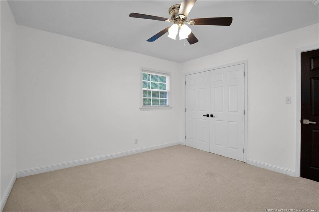 309 Cornith Road Pembroke, NC 28372 - Photo 29 of 40 an empty room with a window and a fan