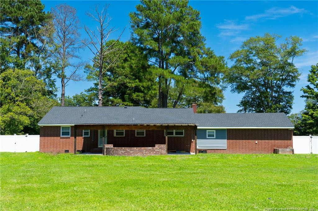 309 Cornith Road Pembroke, NC 28372 - Photo 40 of 40 a front view of a house with a garden