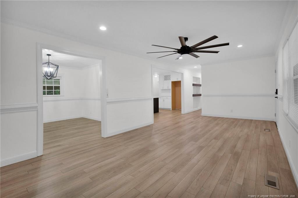 309 Cornith Road Pembroke, NC 28372 - Photo 9 of 40 wooden floor in an empty room with a window