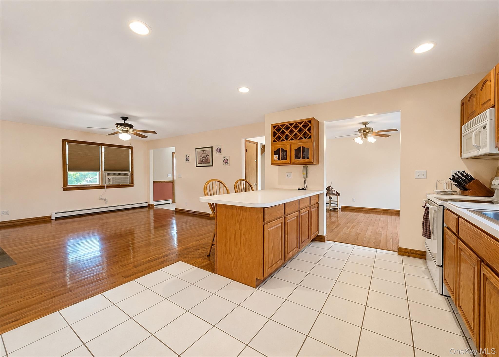 635 Farmveu Road Mattituck, NY 11952 - Photo 10 of 30 Kitchen looking into living room and dining room