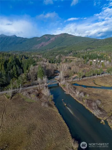 a view of a lake with mountain