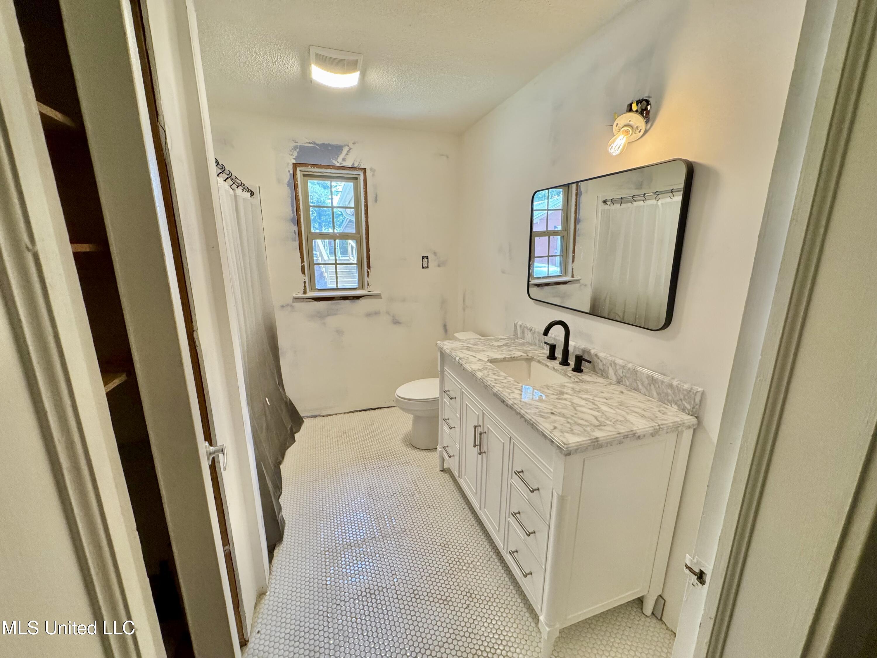 214 East Church Street Quitman, MS 39355 - Photo 12 of 22 Downstairs bathroom