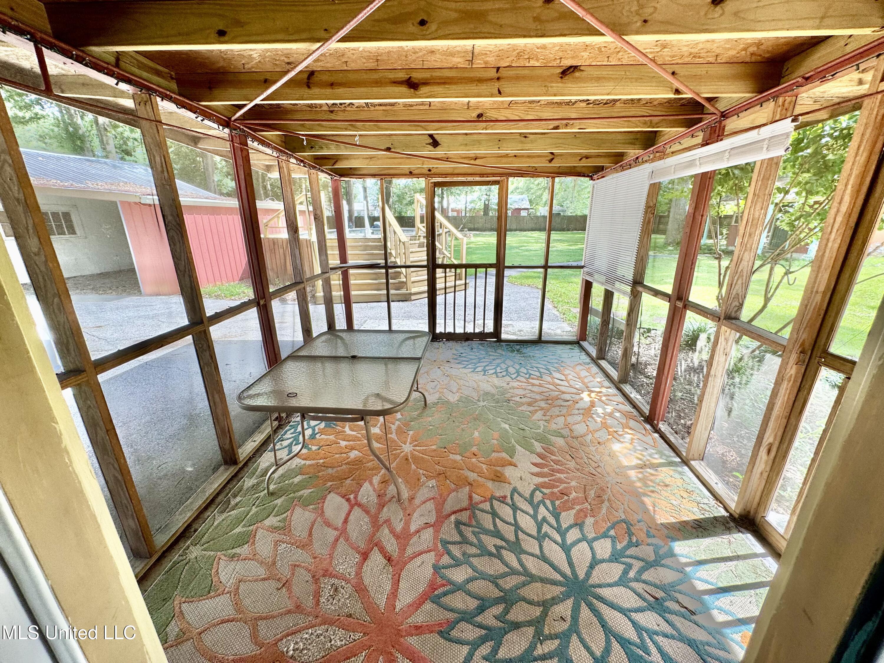 214 East Church Street Quitman, MS 39355 - Photo 10 of 22 Screened in back porch