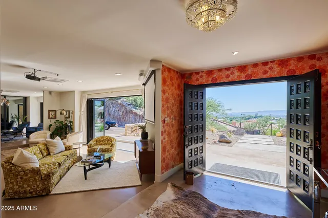 a bedroom with a bed and a couch