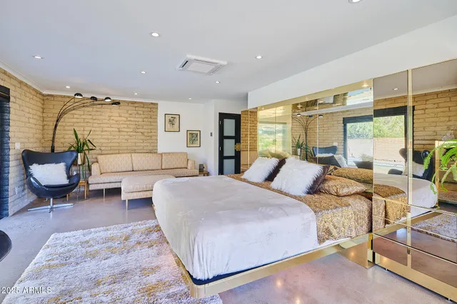 a large bathroom with a double vanity sink a mirror and shower