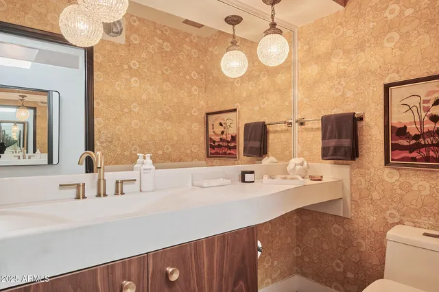 a view of a backyard with furniture and a table