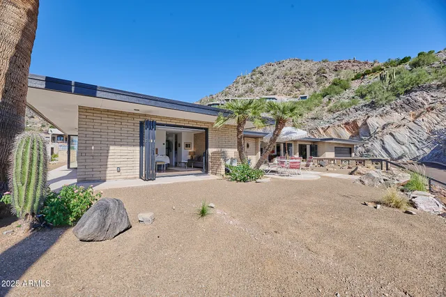 a view of a house with swimming pool