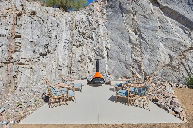 a view of a swimming pool with a patio