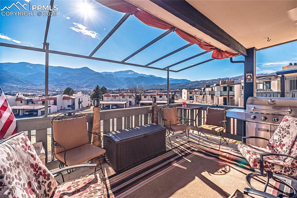 1126 Fontmore Road, Unit C Colorado Springs, CO 80904 - Photo 12 of 35 a view of a balcony with chairs