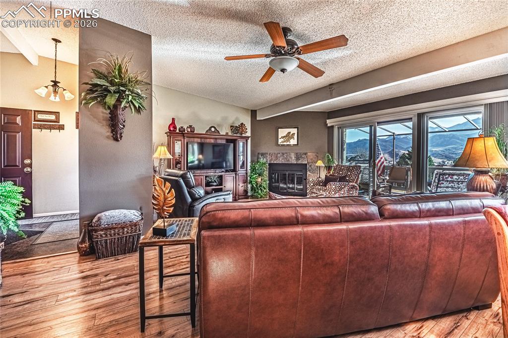 1126 Fontmore Road, Unit C Colorado Springs, CO 80904 - Photo 16 of 35 a living room with furniture and a large window