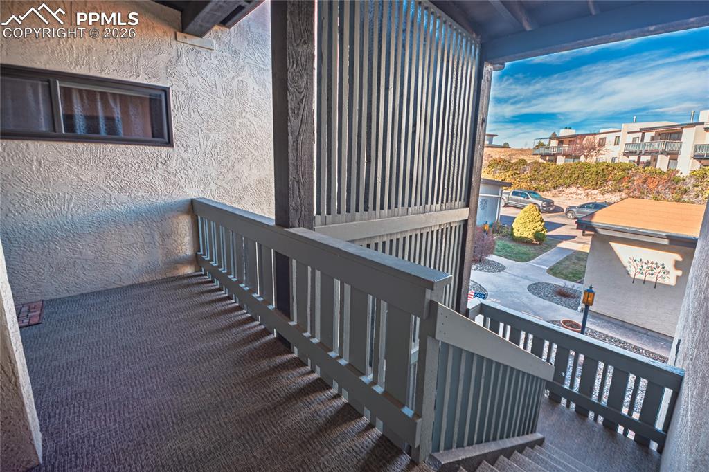 1126 Fontmore Road, Unit C Colorado Springs, CO 80904 - Photo 2 of 35 a view of a balcony with a floor to ceiling window