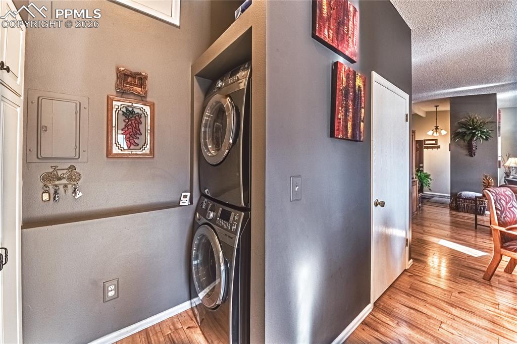 1126 Fontmore Road, Unit C Colorado Springs, CO 80904 - Photo 22 of 35 a view of a hallway with washer and dryer