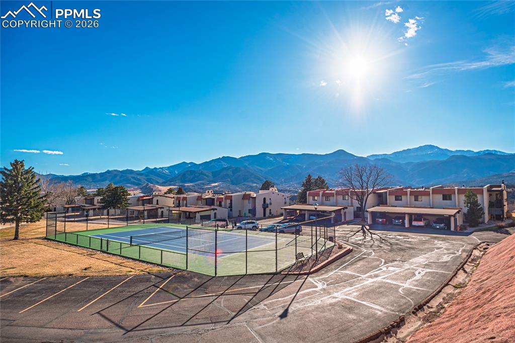 1126 Fontmore Road, Unit C Colorado Springs, CO 80904 - Photo 35 of 35 a view of a swimming pool with a table and chairs