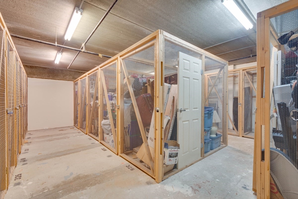 1 Watermill Place, Unit 308 Arlington, MA 02476 - Photo 21 of 27 a view of a hallway with stairs