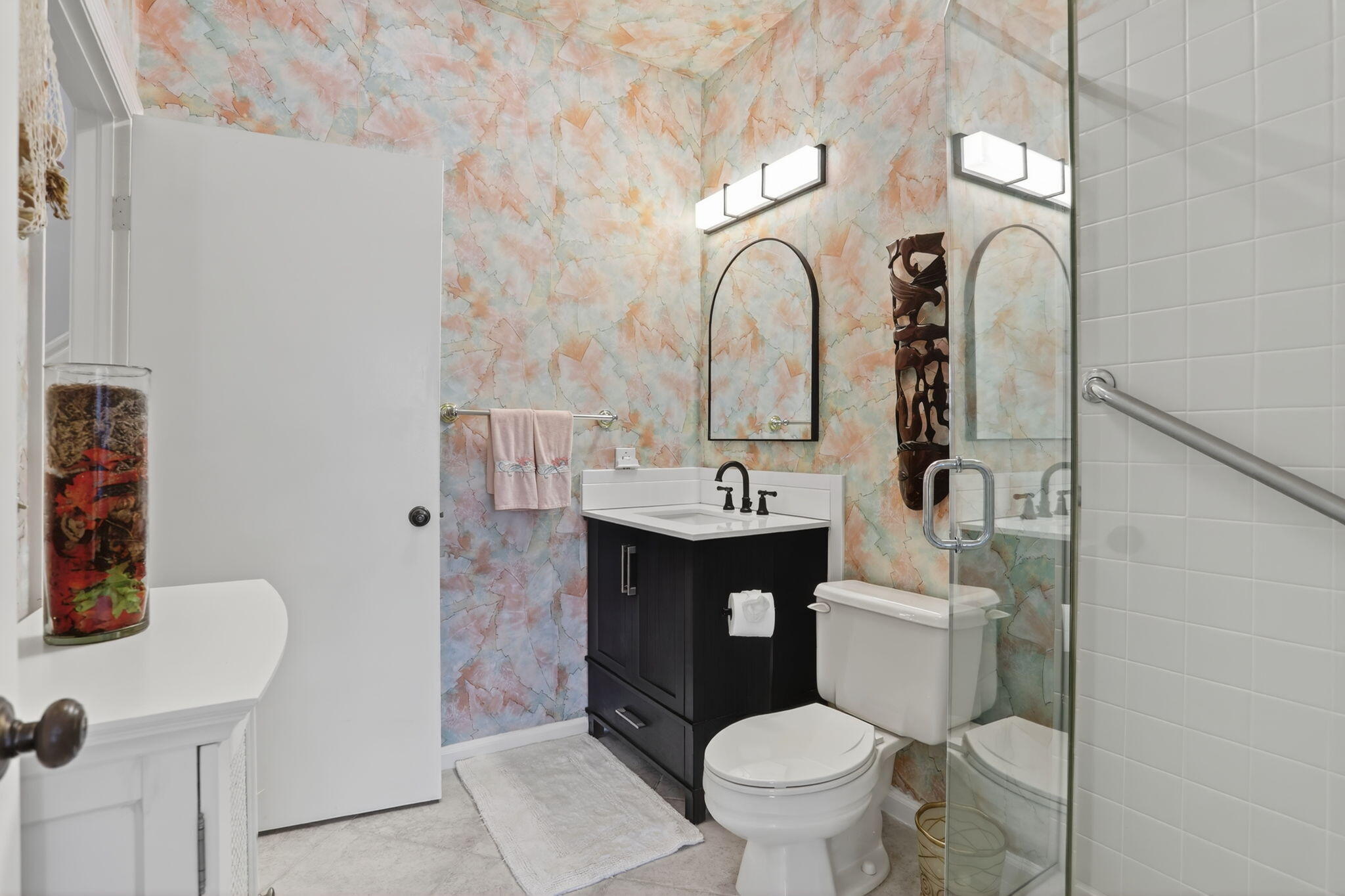 6806 Via Regina Boca Raton, FL 33433 - Photo 23 of 51 a bathroom with a toilet sink and mirror