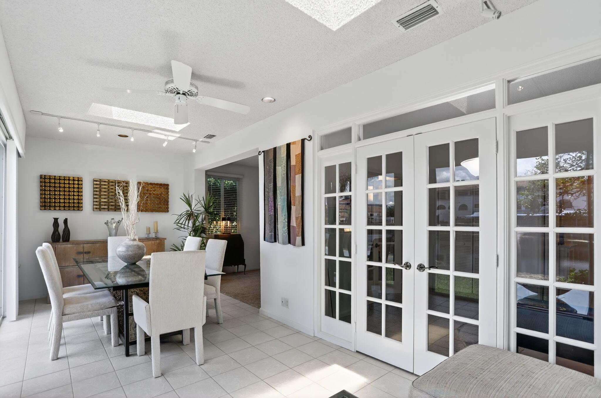 6806 Via Regina Boca Raton, FL 33433 - Photo 24 of 51 a view of a dining room with furniture window and wooden floor