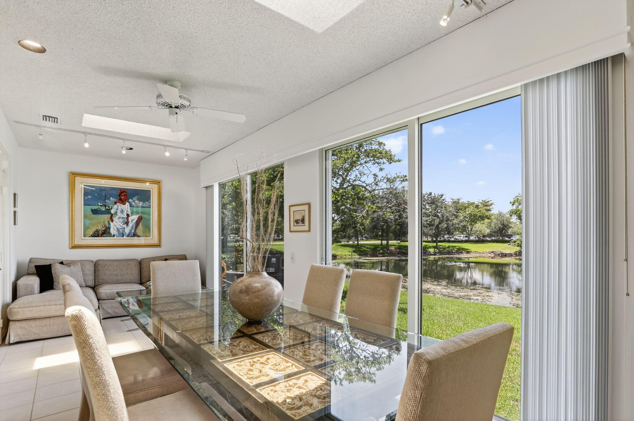 6806 Via Regina Boca Raton, FL 33433 - Photo 27 of 51 a living room with furniture and a large window